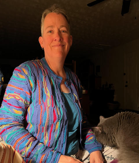 Amber, wearing  “The Obligatory Composer Sweater” and Putzin